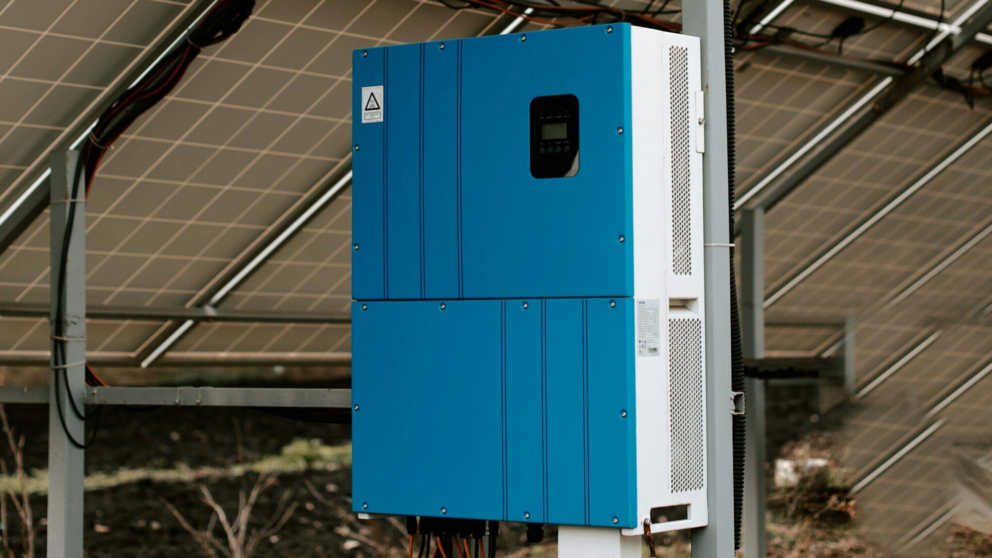 Home battery storage unit installed beneath a solar array